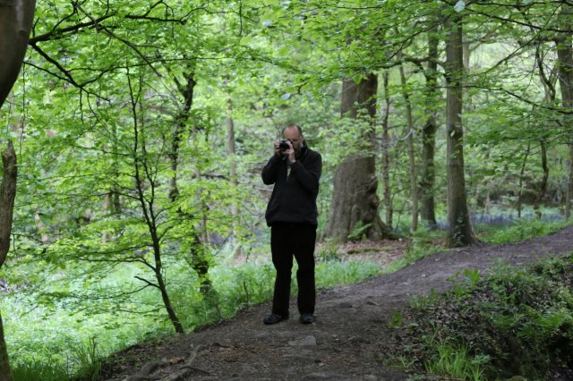 Taking photo in the woods
