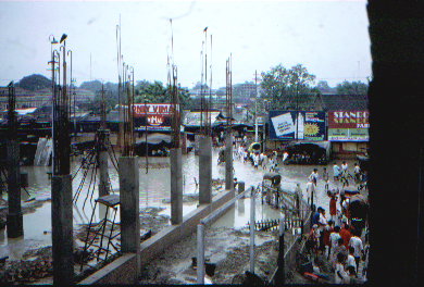 Mazafarpur street, unfinished buildings and floods