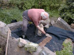 Preparing the lining of the watercourse